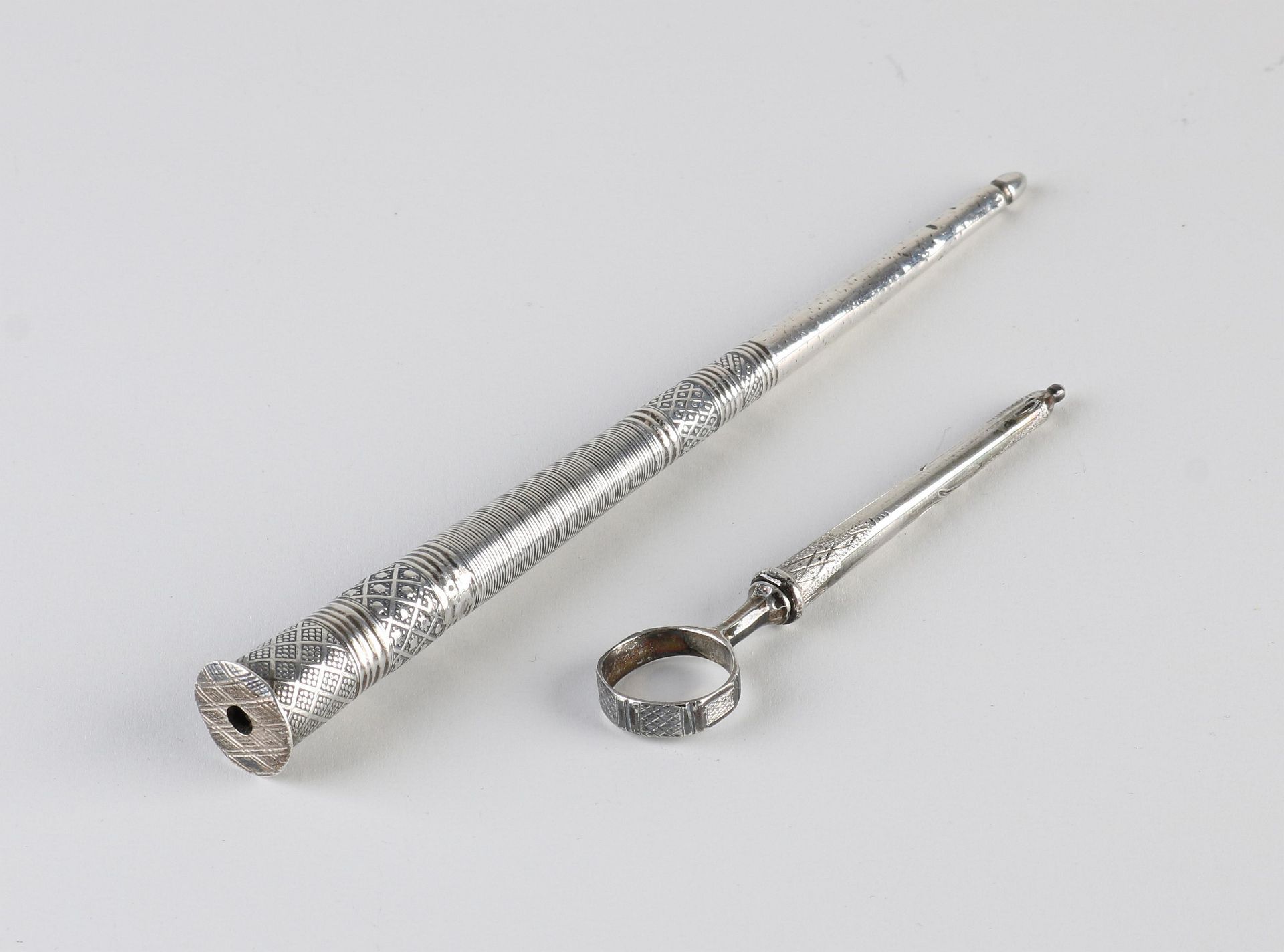 Silver knitting needle holder and awl