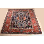 Antique Persian Heriz rug, 174 x 149 cm.
