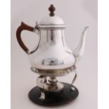 Silver teapot with stove