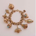 Gold bracelet with charms