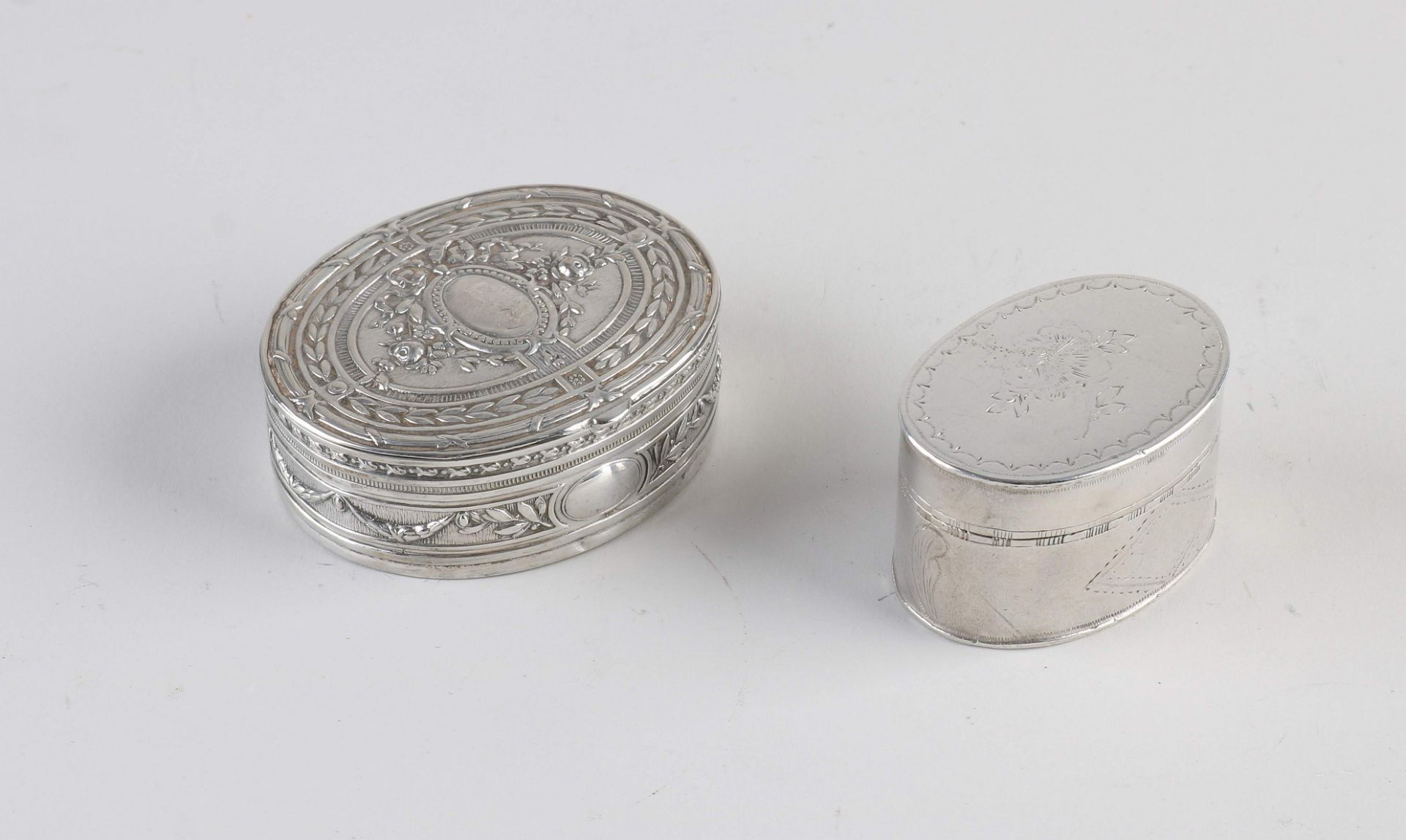 2 silver boxes