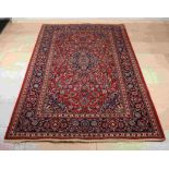 Large Persian rug, 217 x 131 cm.