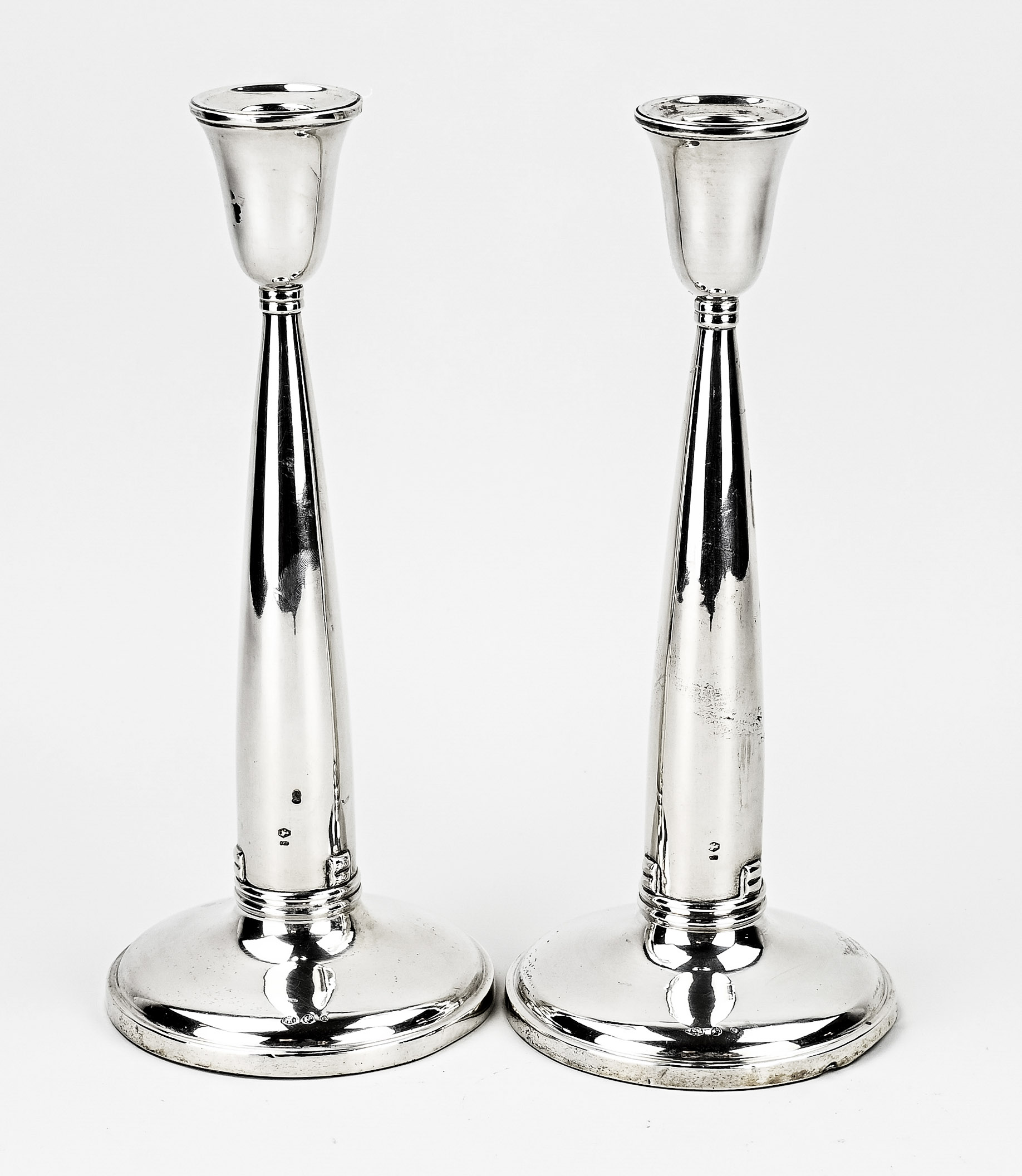 Two silver candlesticks