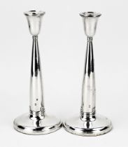 Two silver candlesticks