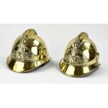 Two antique French fire helmets