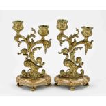 Two gold plated candlesticks, H 25 - 26 cm.