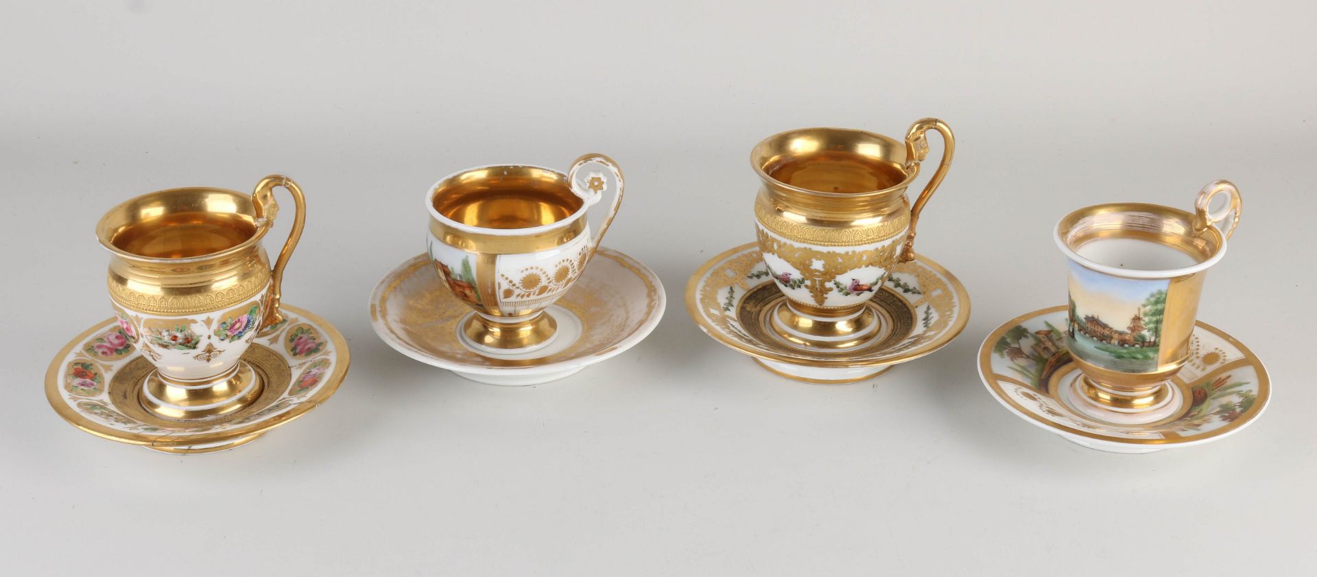 Four Empire cups and saucers