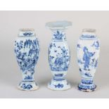 Three 18th century Delft vases, H 14 - 15 cm.