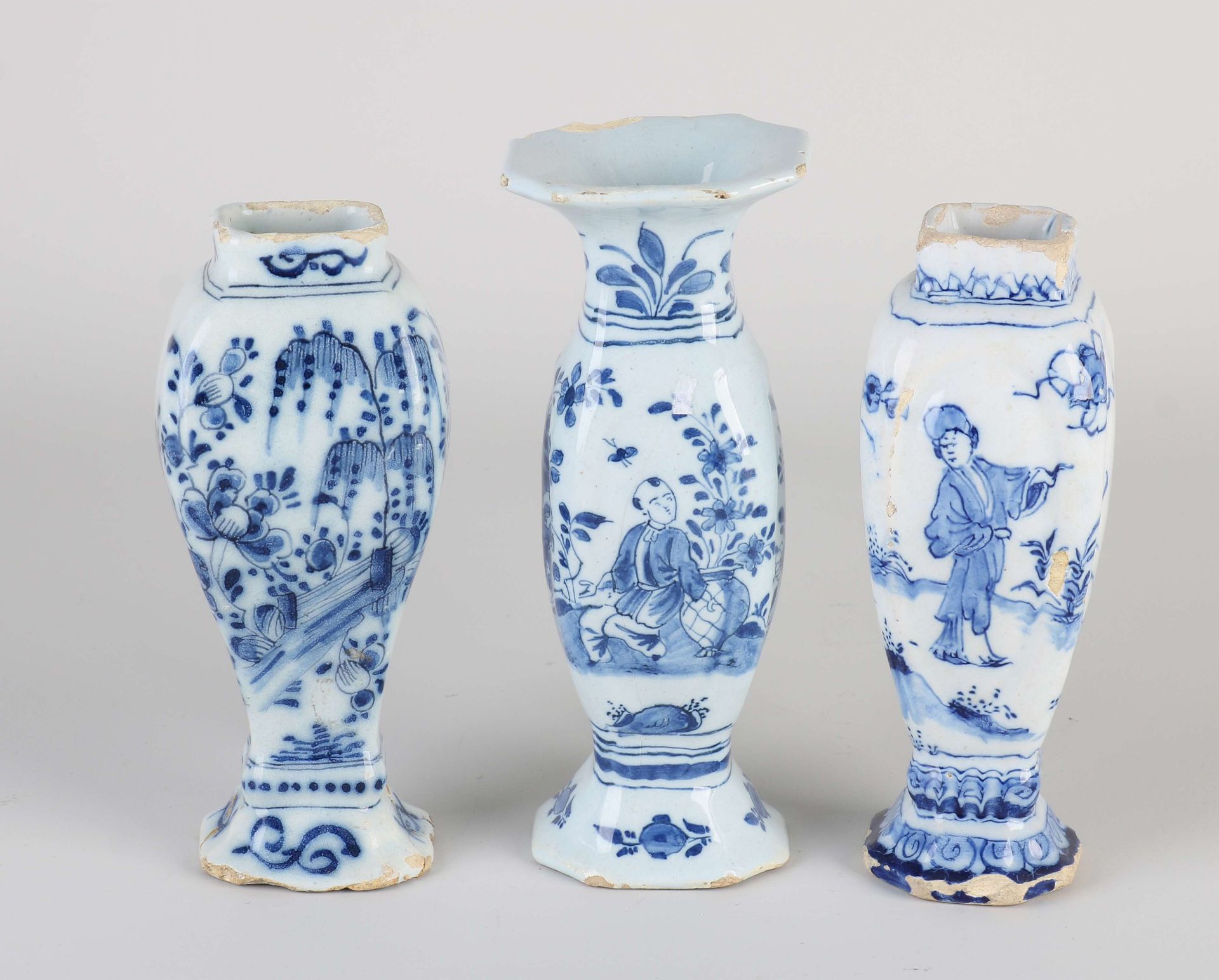 Three 18th century Delft vases, H 14 - 15 cm.