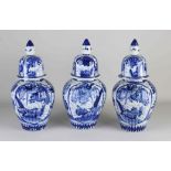 Three Japanese Imari vases with lids, H 31 cm.