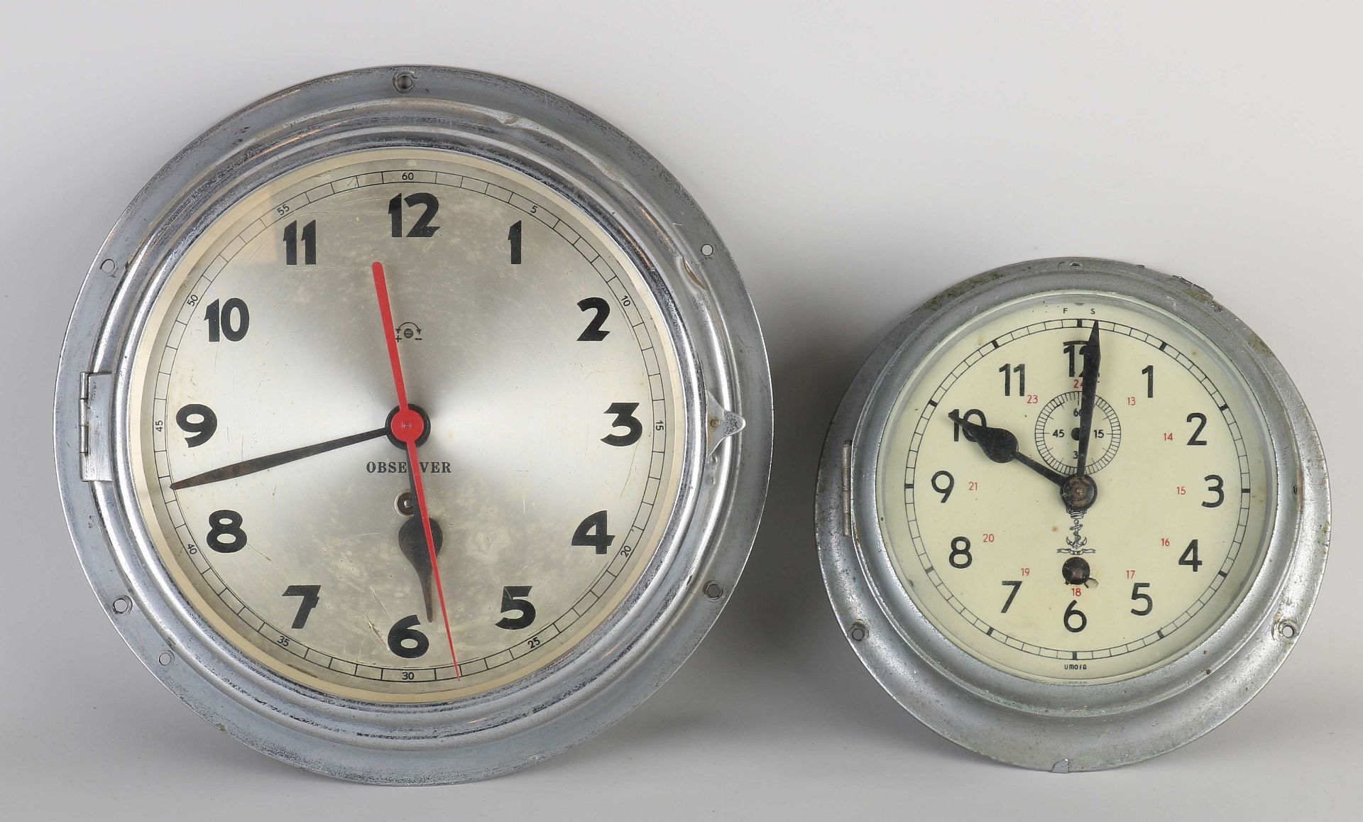 Two ship's clocks Ø 19 - 26 cm.