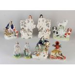 Eight antique English Staffordshire figures