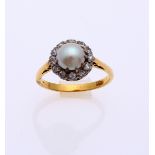 Gold ring with pearl and diamond