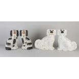 Four antique English Staffordshire dogs