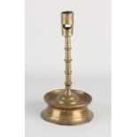 17th century skirt candlestick, H 23 cm.