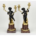 Two bronze candlesticks, H 50 cm.