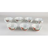 Seven antique Chinese bowls Ø 12 cm.