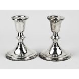 Two silver candlesticks