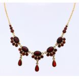 Gold choker with garnet