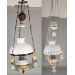 Two hanging petroleum lamps