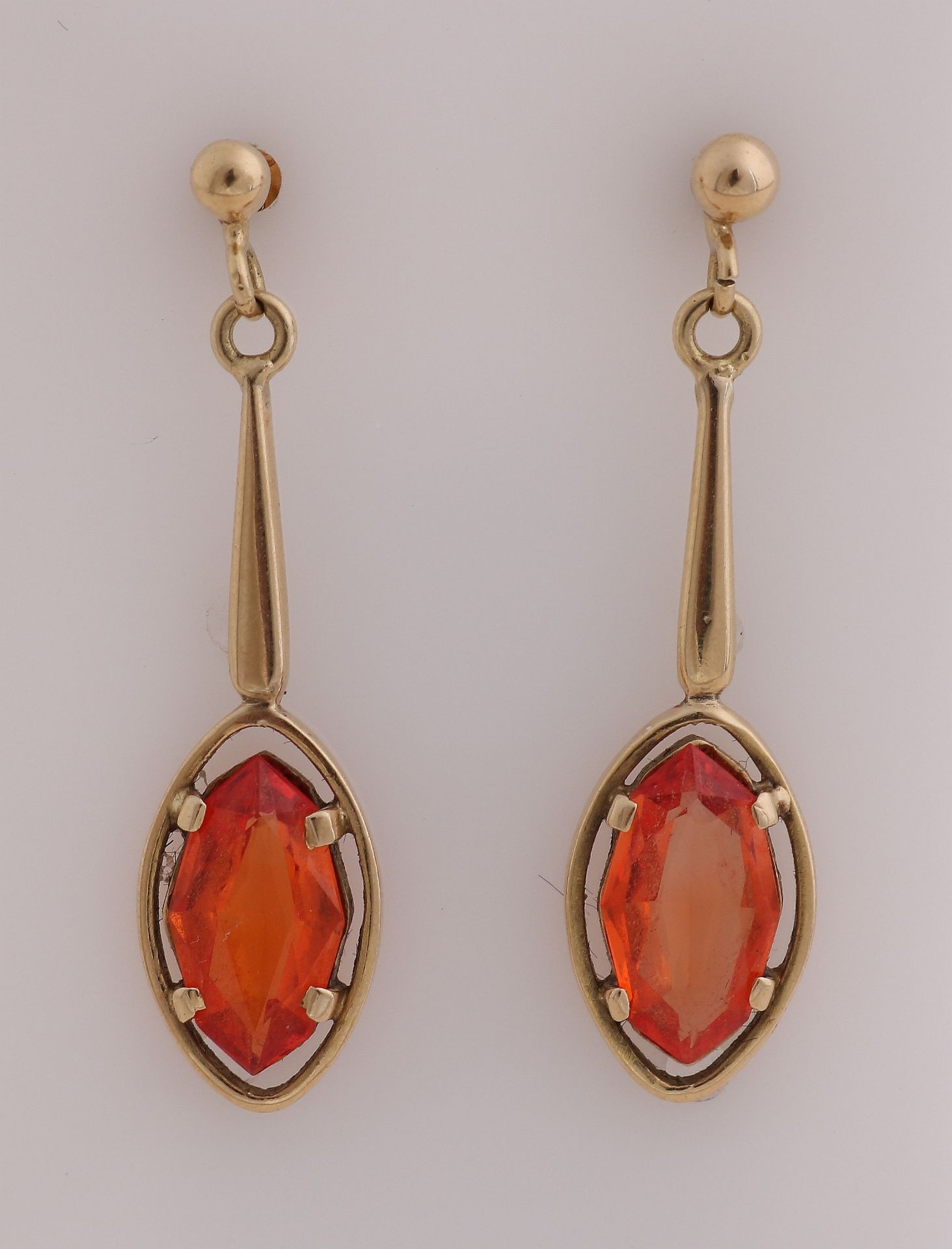 Gold earrings orange stone