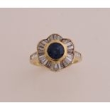 Gold ring with sapphire and diamond