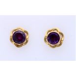 Gold stud earrings with amethyst
