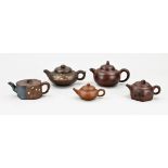 Five Chinese teapots, 11 - 16 cm.