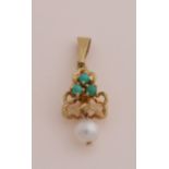 Gold pendant with pearl and turquoise.