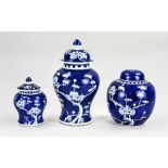 Three Chinese lidded vases, 17 - 30 cm.