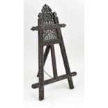 Antique carved easel, H 70 cm.