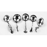 Five silver cream spoons