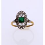 Antique ring with emerald