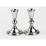 Two silver candlesticks