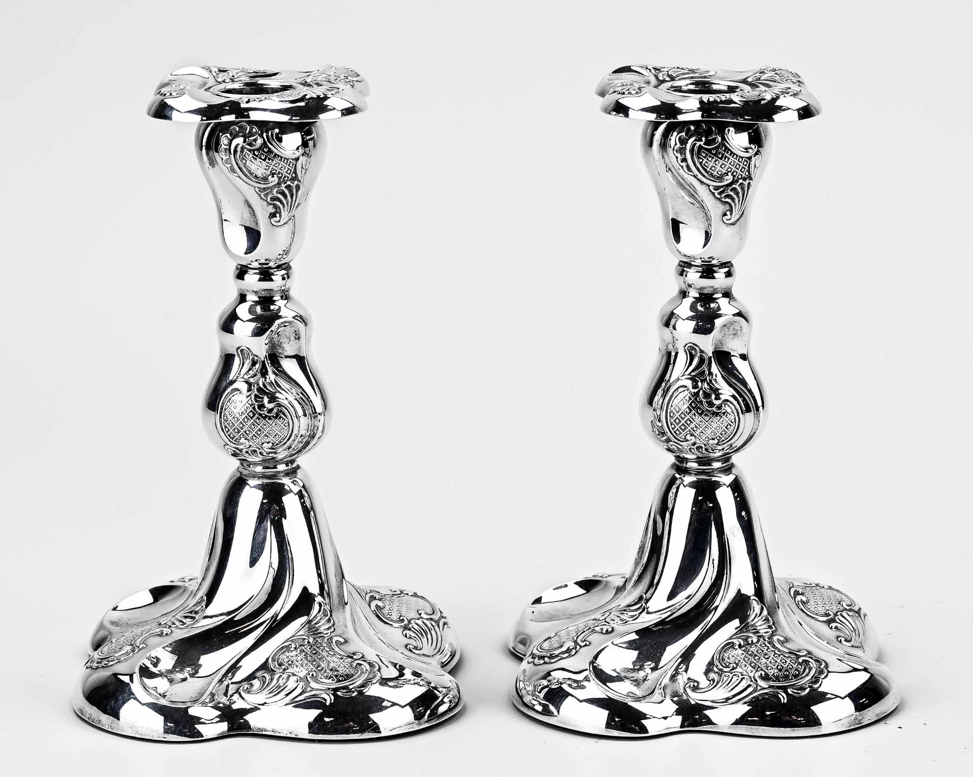 Two silver candlesticks