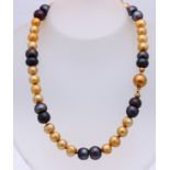 Necklace with black and yellow pearls