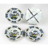 Four 18th century Delft plates Ø 23 cm.