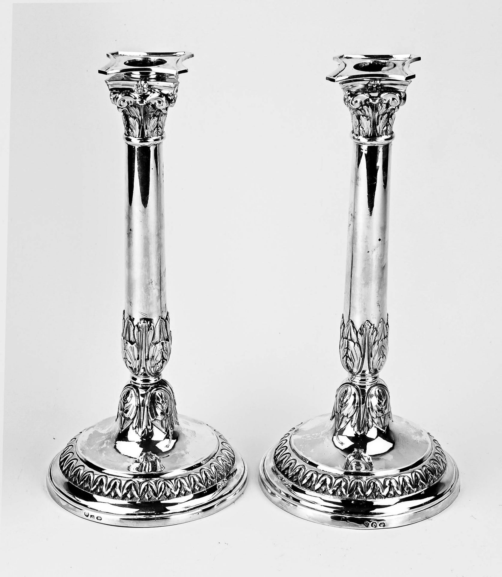 Two silver candlesticks