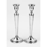 Two silver candlesticks