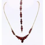 Necklace and bracelet with garnet