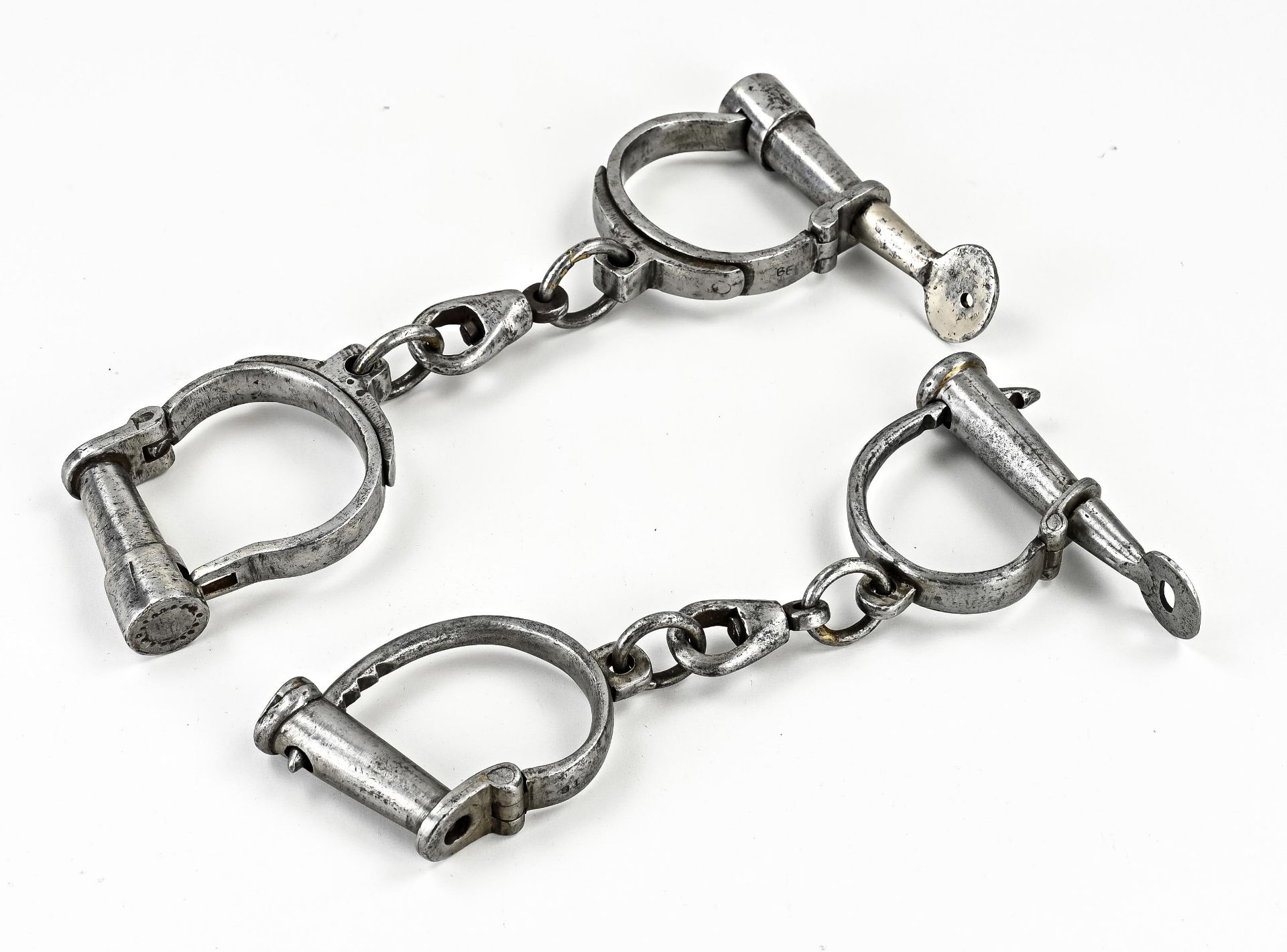 Two antique iron handcuffs