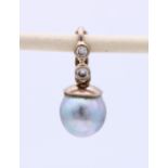 White gold pendant with diamond and pearl