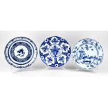 Three 18th century Delft plates Ø 22 - 23 cm.