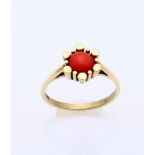 Gold ring with red coral