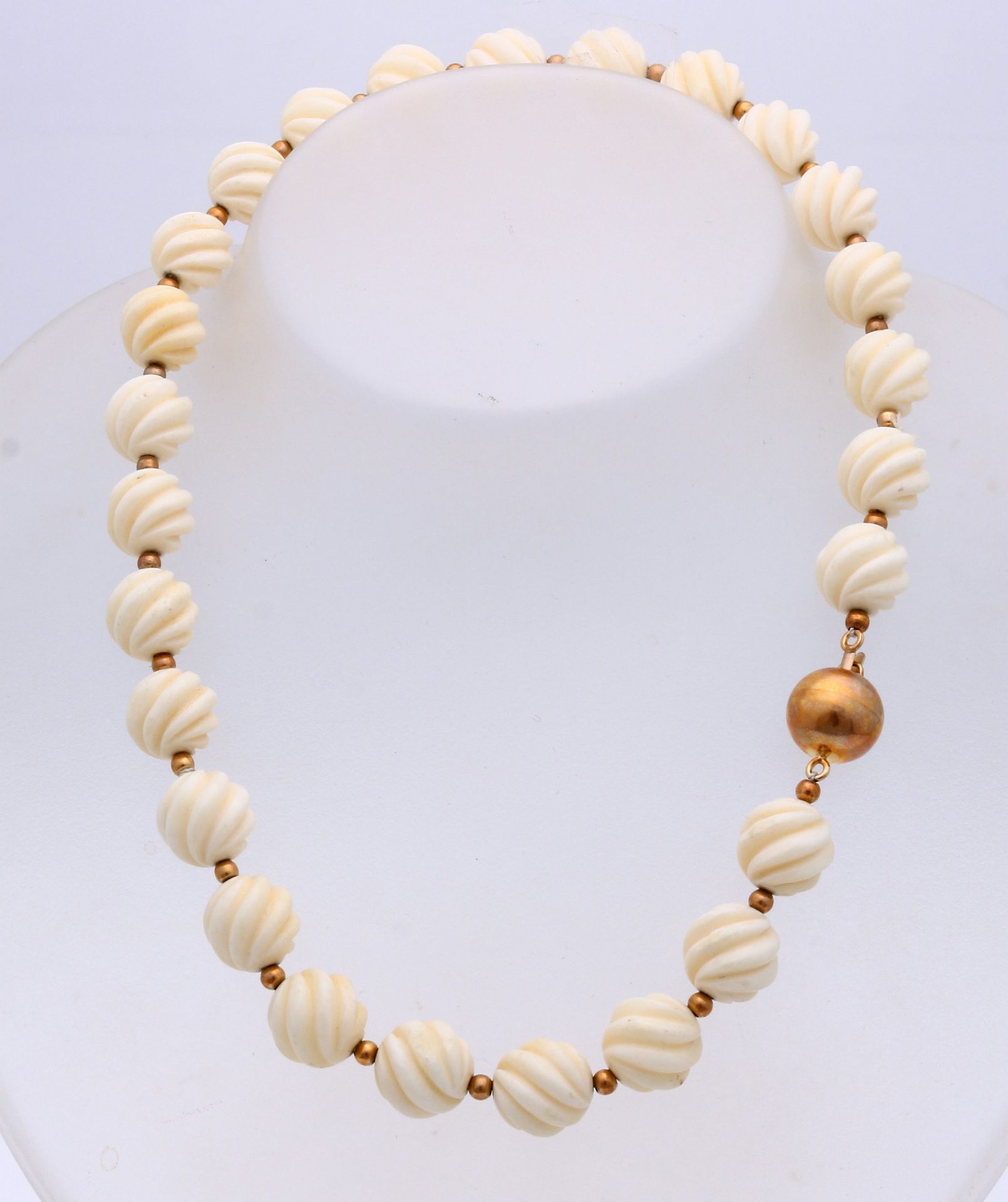 Bone necklace with gold