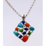 Silver necklace and pendant with precious stones