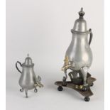 Two antique pewter tap jugs, 1800