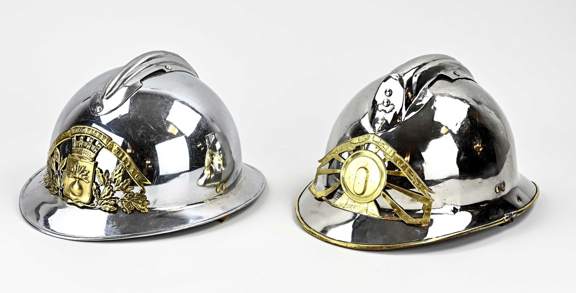 Two antique Japanese fire helmets