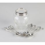 Spoon vase with silver spoons