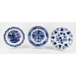 Three 18th century Delft plates Ø 22 - 23 cm.